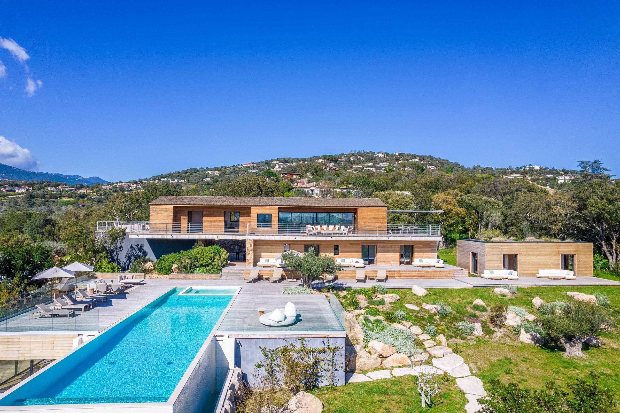 Aerial view of the residence and pool terrace from the grounds