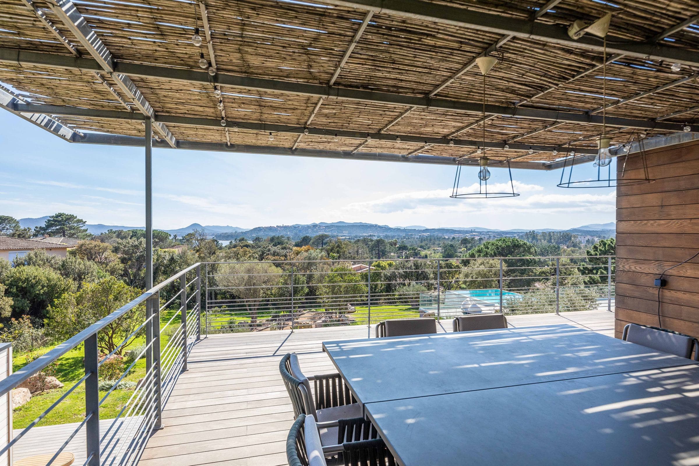 Dining terrace under the reed pergola